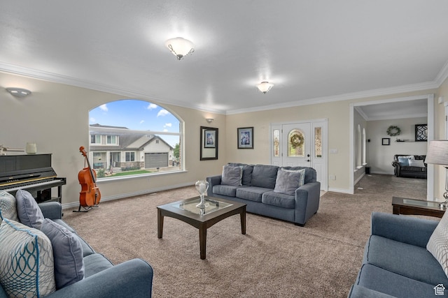 living room with carpet, ornamental molding, and baseboards