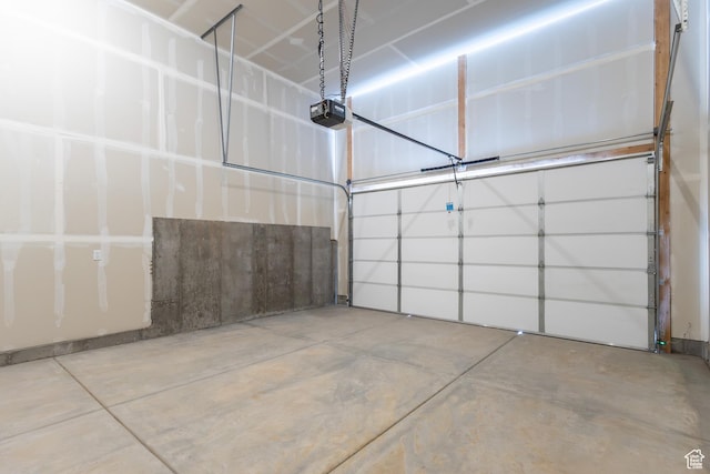 709 S 3575 W Unit 147, West Weber, UT 84401 - garage featuring a garage door opener