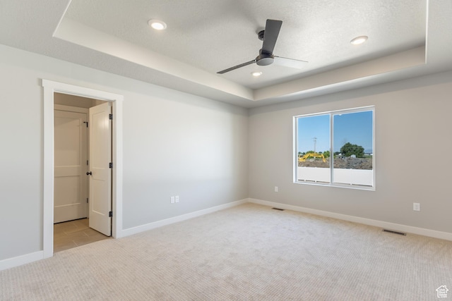 709 S 3575 W Unit 147, West Weber, UT 84401 - empty room featuring light carpet, a raised ceiling, a ceiling fan, and recessed lighting