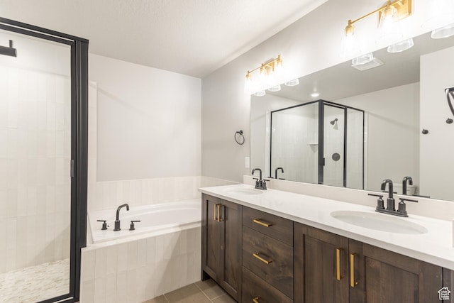709 S 3575 W Unit 147, West Weber, UT 84401 - bathroom with a garden tub, a shower stall, double vanity, and tile patterned flooring