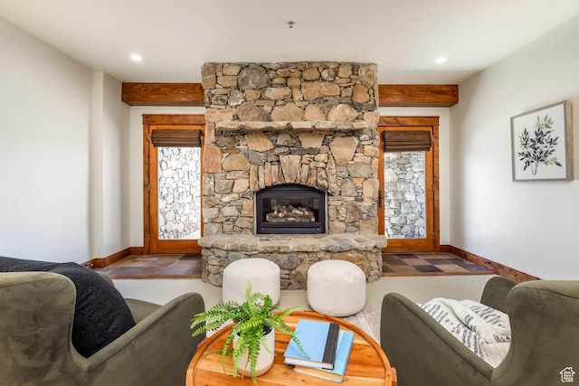 2000 W Red Hawk Trl, Park City, UT 84098 - living room featuring baseboards, a stone fireplace, and recessed lighting