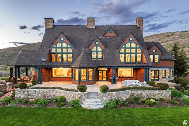 2000 W Red Hawk Trl, Park City, UT 84098 - back of property with an outdoor living space, french doors, a patio, and a yard