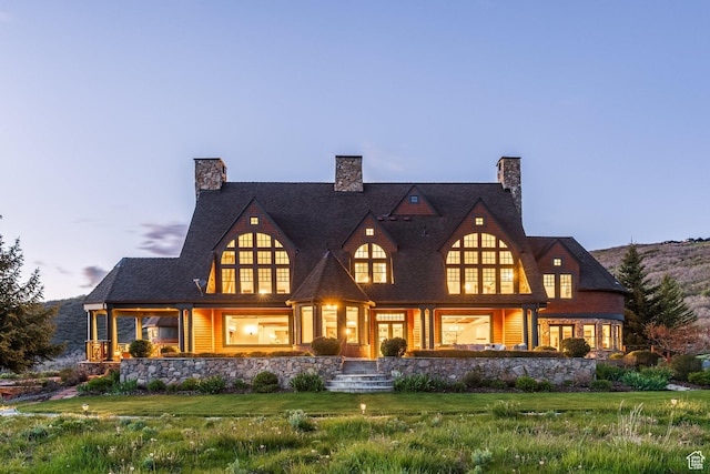 2000 W Red Hawk Trl, Park City, UT 84098 - rear view of house featuring stone siding and a chimney