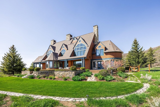 2000 W Red Hawk Trl, Park City, UT 84098 - rear view of house with a lawn and a chimney
