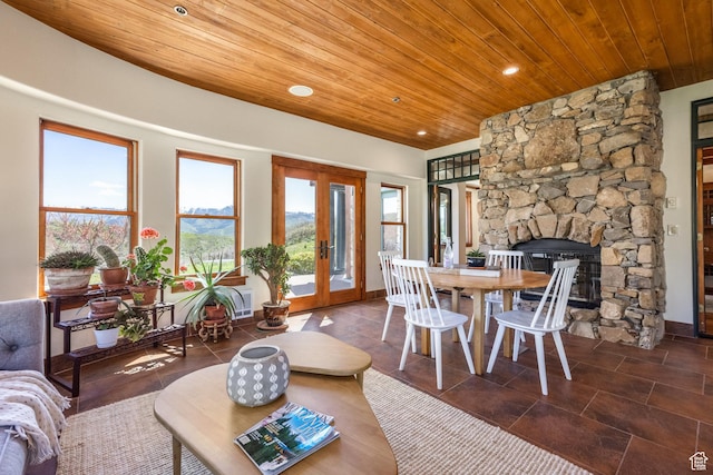 2000 W Red Hawk Trl, Park City, UT 84098 - tiled dining room featuring wooden ceiling, french doors, a fireplace, recessed lighting, and baseboards