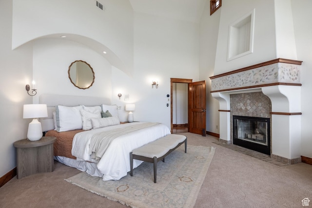 2000 W Red Hawk Trl, Park City, UT 84098 - bedroom with carpet, a tiled fireplace, baseboards, and high vaulted ceiling