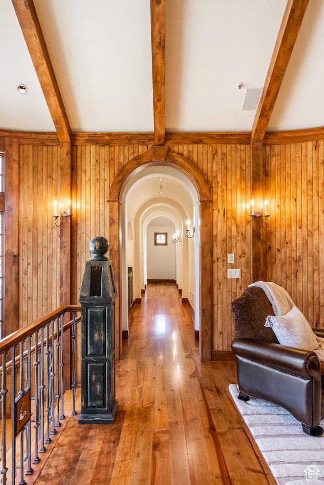 2000 W Red Hawk Trl, Park City, UT 84098 - hall with beam ceiling, wooden walls, wood-type flooring, and arched walkways