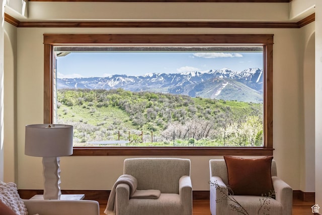 2000 W Red Hawk Trl, Park City, UT 84098 - sitting room featuring a mountain view, plenty of natural light, wood finished floors, and crown molding