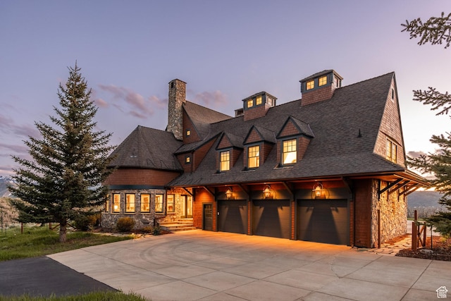 2000 W Red Hawk Trl, Park City, UT 84098 - shingle-style home featuring driveway, stone siding, an attached garage, and a shingled roof