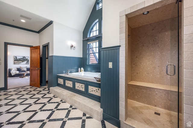 2000 W Red Hawk Trl, Park City, UT 84098 - bathroom with a bath, a shower stall, wainscoting, and high vaulted ceiling