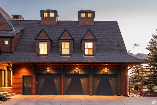2000 W Red Hawk Trl, Park City, UT 84098 - view of front of property featuring concrete driveway, a shingled roof, and a garage