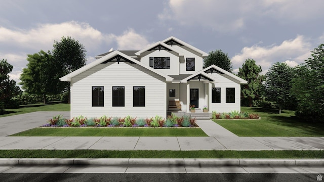 modern inspired farmhouse featuring a front lawn