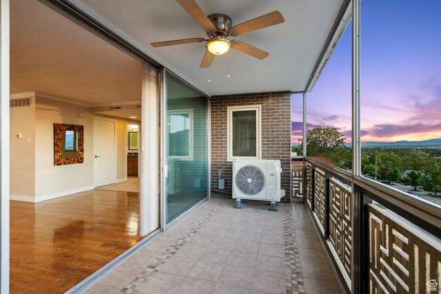 515 S 1000 E Unit 202, Salt Lake City, UT 84102 - balcony at dusk with ceiling fan and a cooling unit