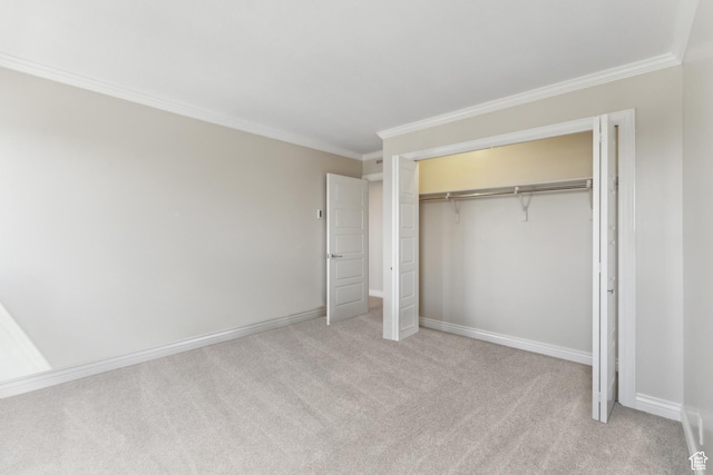 515 S 1000 E Unit 202, Salt Lake City, UT 84102 - unfurnished bedroom featuring ornamental molding, light carpet, a closet, and baseboards