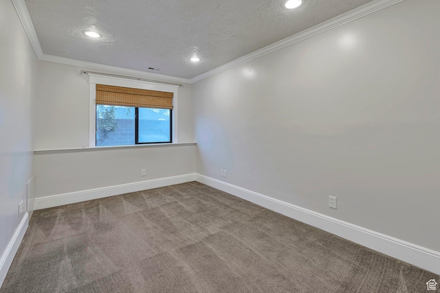 carpeted empty room featuring crown molding, baseboards, recessed lighting, and a textured ceiling