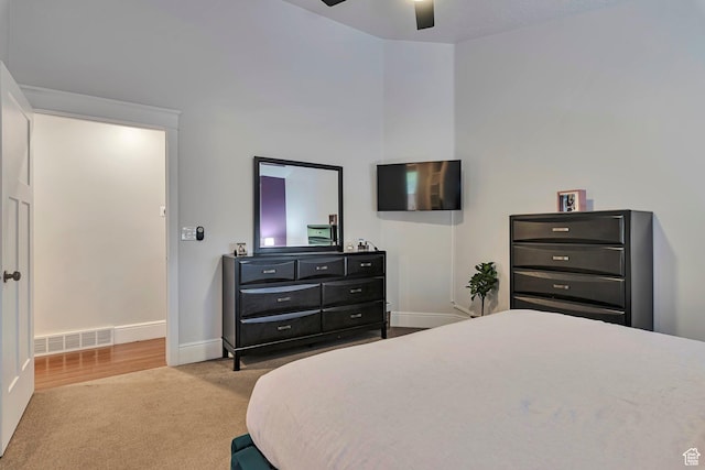 bedroom featuring carpet flooring, baseboards, and ceiling fan
