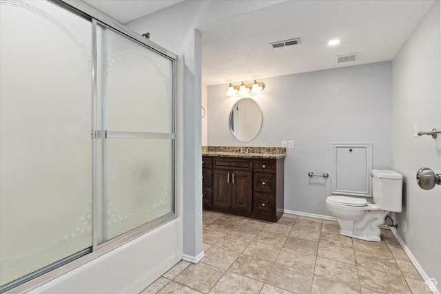 full bathroom featuring baseboards, toilet, vanity, and shower / bath combination with glass door