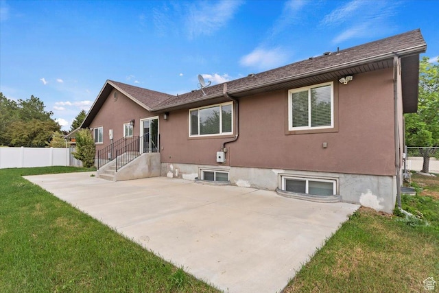 back of property featuring a patio