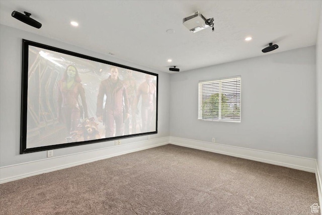 carpeted home theater with recessed lighting and baseboards