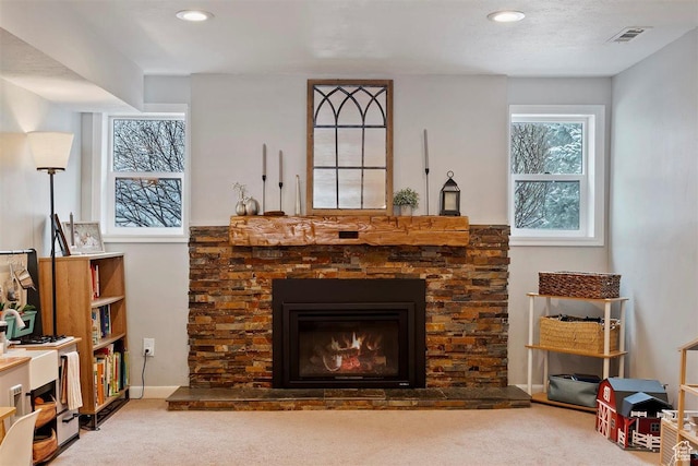 384 W 4200 N, Pleasant View, UT 84414 - carpeted living room featuring a stone fireplace, recessed lighting, and baseboards