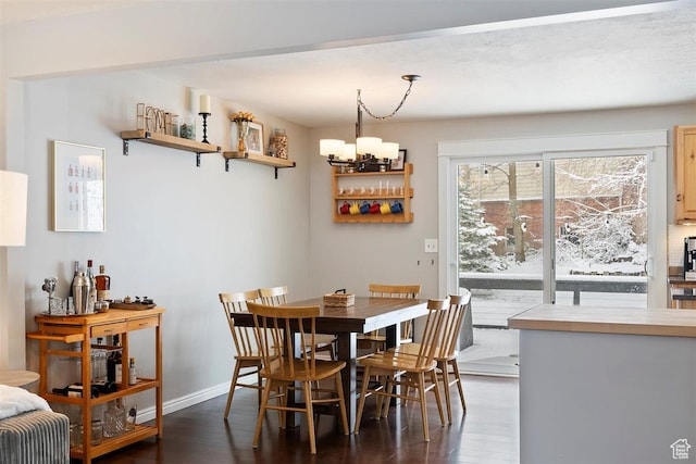 384 W 4200 N, Pleasant View, UT 84414 - dining space with dark wood-type flooring, a chandelier, and baseboards