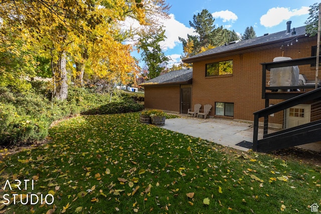 384 W 4200 N, Pleasant View, UT 84414 - view of green lawn with a patio