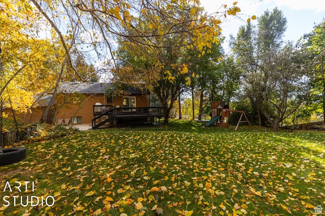 384 W 4200 N, Pleasant View, UT 84414 - view of green lawn with a playground, a wooden deck, and stairs