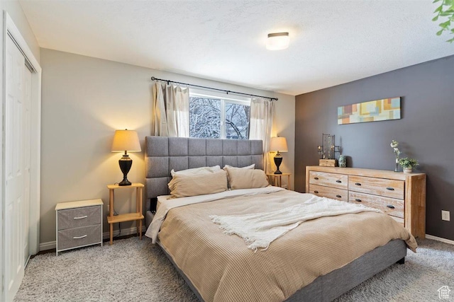 384 W 4200 N, Pleasant View, UT 84414 - carpeted bedroom featuring a closet and baseboards