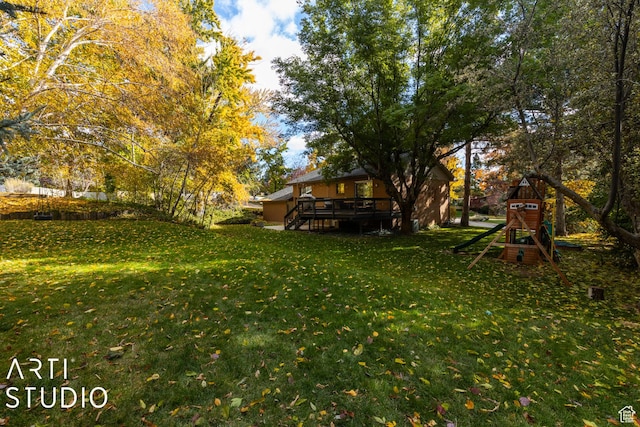384 W 4200 N, Pleasant View, UT 84414 - view of grassy yard with a playground and a wooden deck