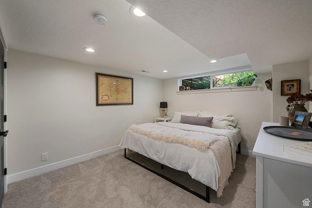 bedroom with carpet, baseboards, recessed lighting, and a textured ceiling
