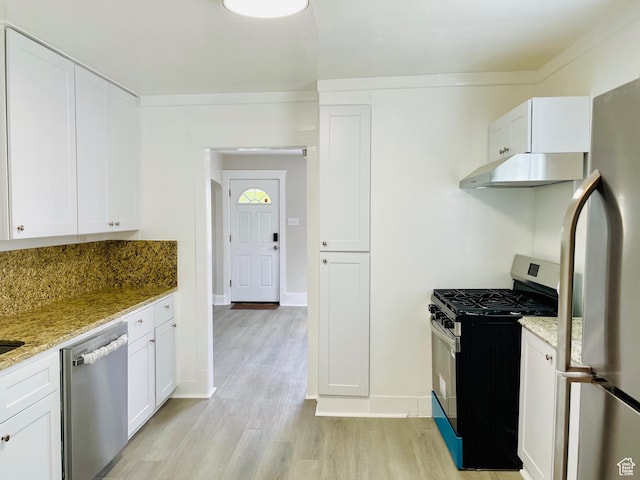 936 E Atkin Ave, Salt Lake City, UT 84106 - kitchen featuring appliances with stainless steel finishes, under cabinet range hood, light wood finished floors, and white cabinetry