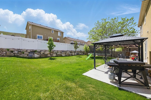 view of yard featuring a patio and a gazebo