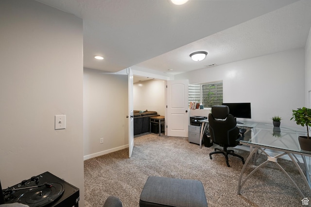 office space featuring carpet flooring and baseboards