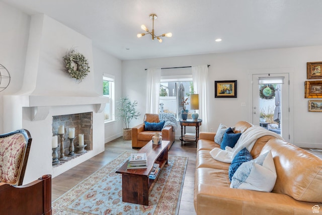 305 E 330 N, Vineyard, UT 84059 - living area with wood finished floors, a chandelier, a fireplace, baseboards, and recessed lighting