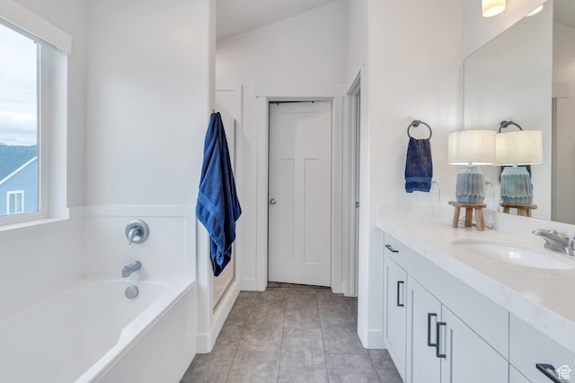 305 E 330 N, Vineyard, UT 84059 - full bathroom with a bath, vanity, and baseboards