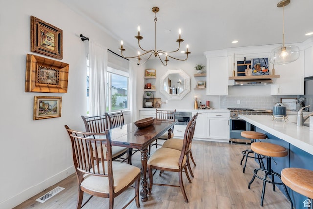 305 E 330 N, Vineyard, UT 84059 - dining room featuring light wood finished floors, a chandelier, baseboards, and recessed lighting
