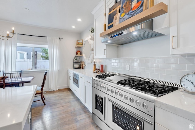 305 E 330 N, Vineyard, UT 84059 - kitchen with open shelves, decorative backsplash, light wood-style floors, white cabinetry, and recessed lighting
