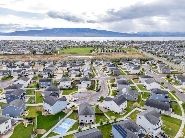 305 E 330 N, Vineyard, UT 84059 - aerial view of property and surrounding area featuring nearby suburban area and a water and mountain view