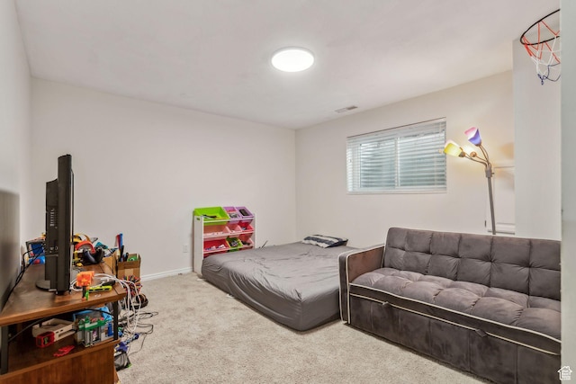 bedroom featuring carpet floors and baseboards