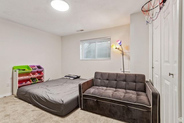 bedroom featuring carpet