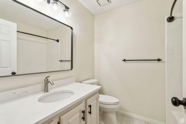 full bath with toilet, tile patterned floors, vanity, and baseboards