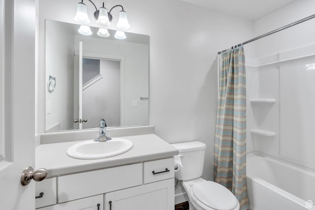 bathroom featuring toilet, vanity, and shower / bath combination with curtain