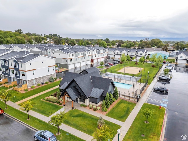 aerial perspective of suburban area with a pool