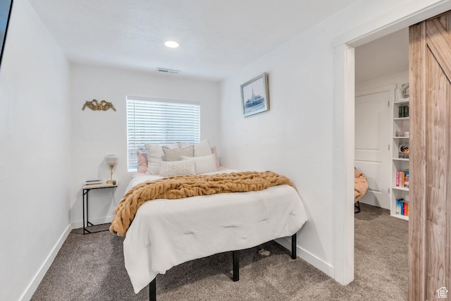 bedroom featuring carpet floors, baseboards, and recessed lighting