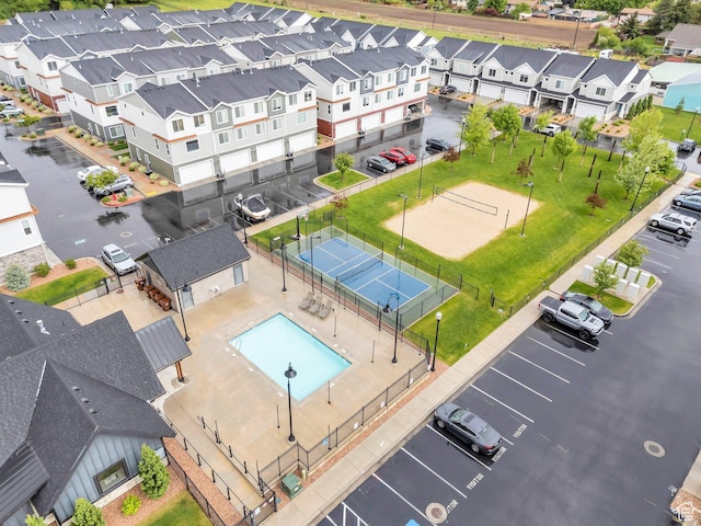 aerial perspective of suburban area with a pool area