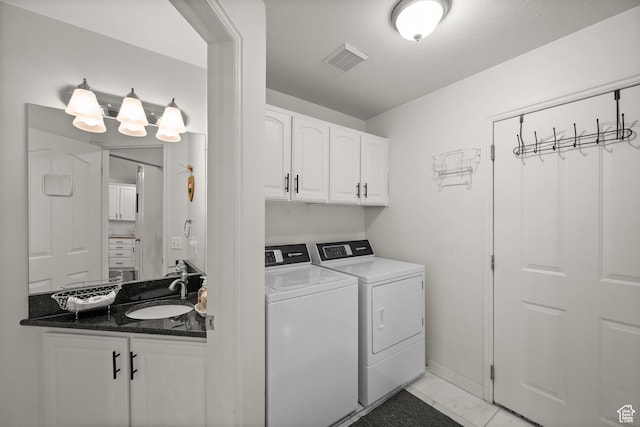 3678 S Vineyard Ct, Millcreek, UT 84106 - laundry area with a sink, washing machine and clothes dryer, and baseboards