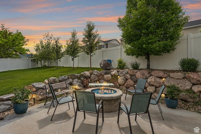 view of patio / terrace featuring a fire pit