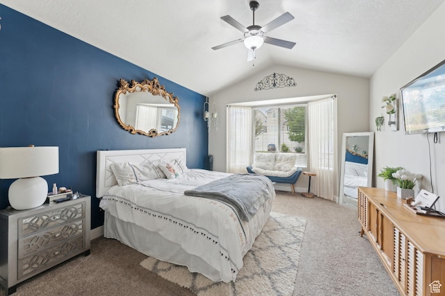 bedroom with lofted ceiling, carpet, and ceiling fan