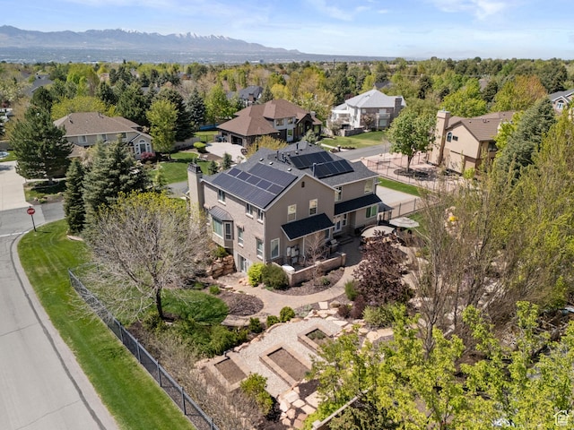 aerial view of residential area with a mountainous background
