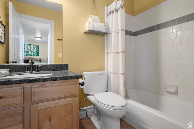 bathroom with toilet, vanity, and shower / bath combination with curtain